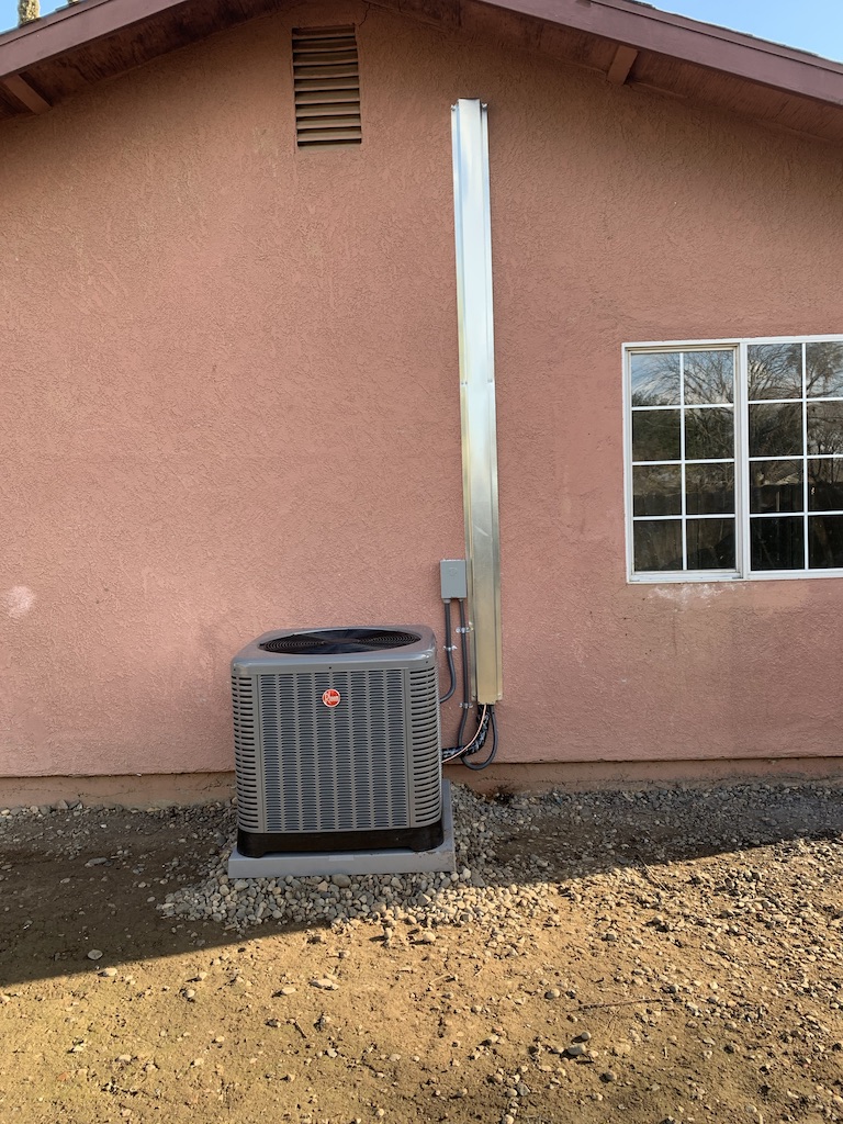 Crew working on a furnace installation